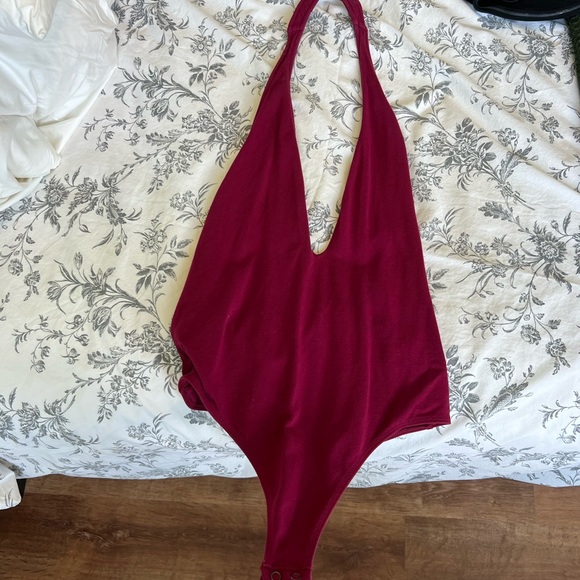 Size Small open back V cut Express thong bodysuit. Tag is cutoff - Picture 1 of 3